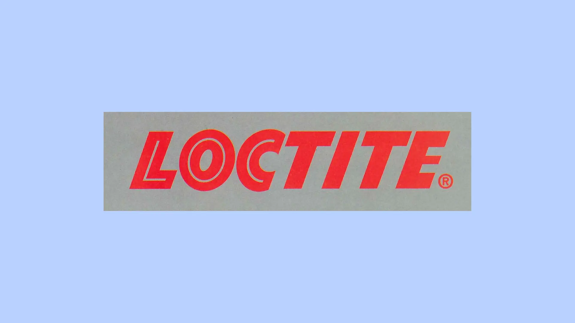 Le logo rouge Loctite sur un fond gris.